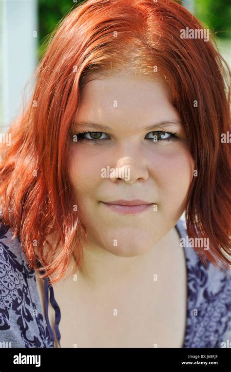 Portrait chubby red haired girl Stock Photos and Images